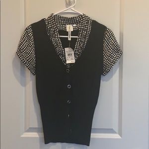 Black and white sweater vest with built in shirt.